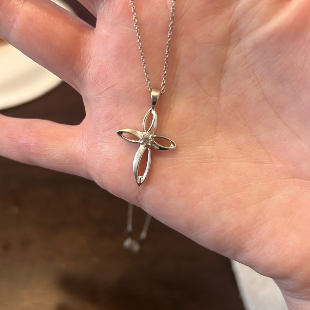 Cross Nevklace from Zales, real diamond. Unsure size maybe 1/16 or 1/8